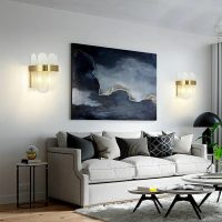 Modern contemporary brass and glass wall light